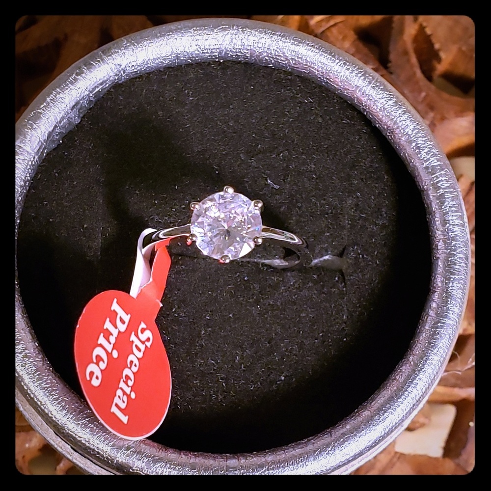 Stunning 1 Carat simulated, 10K white gold ring!